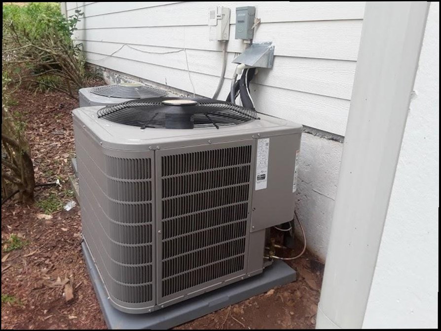 AC condenser unit installed at residential home
